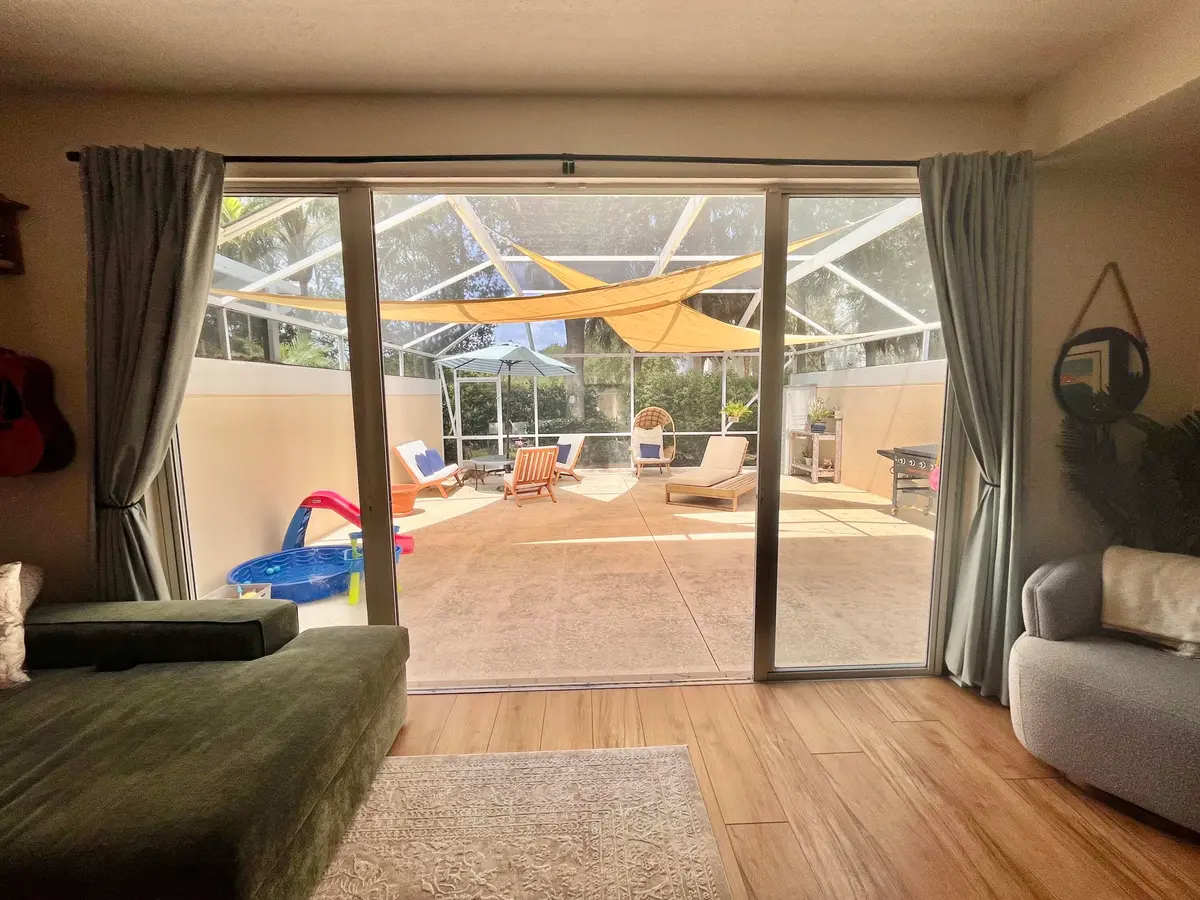 Living room to screened patio at 262 Fortuna Drive, Palm Beach Gardens
