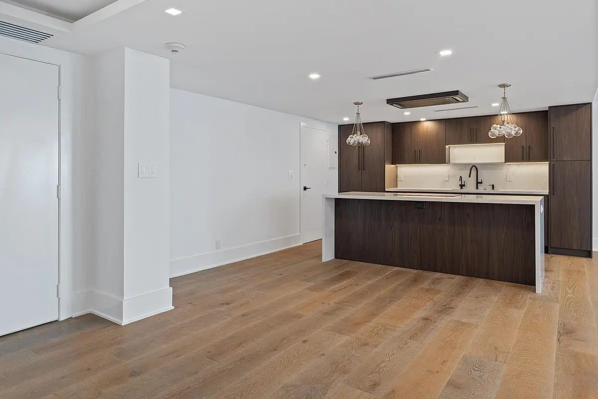 Open kitchen to dining area at 4020 Galt Ocean Drive 409, Fort Lauderdale