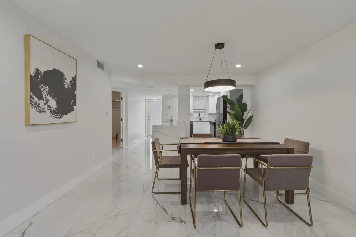 7 B. Dining Room to Kitchen and Foyer at 9523 N Hollybrook Lake Drive 103, Pembroke Pines