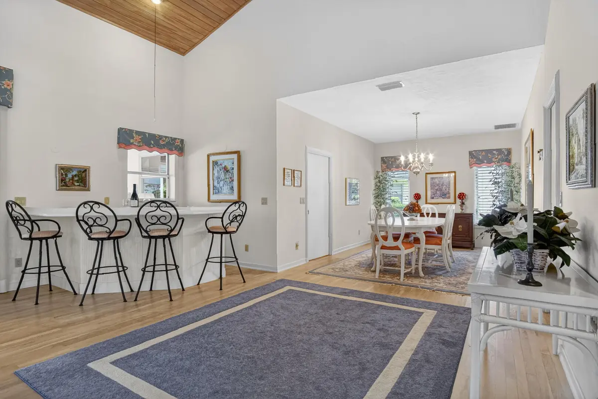 Great room to bar to DR at 7350 Reserve Creek Drive, Port St. Lucie