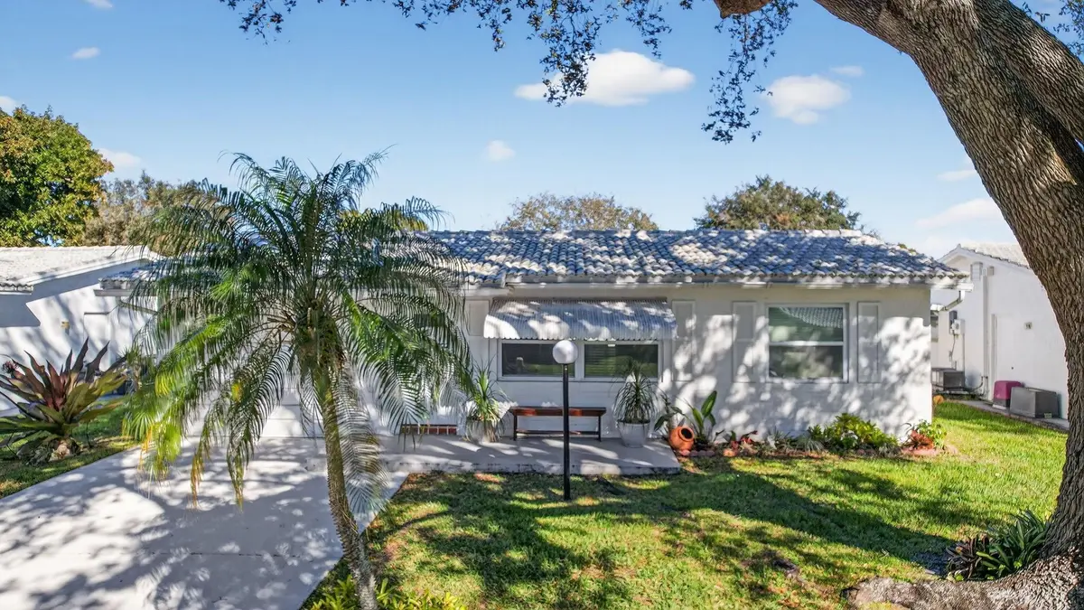 Front of home faces South at 8845 NW 14th Street, Plantation