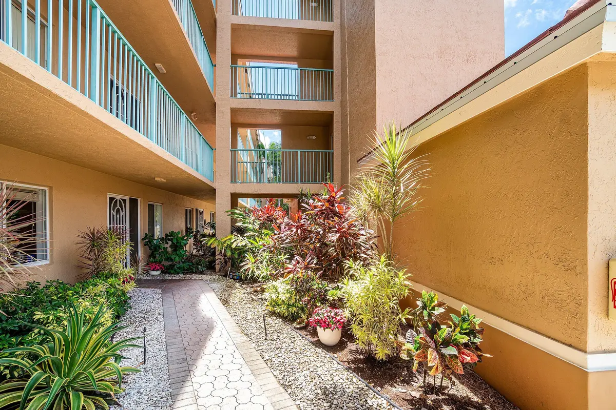 COMPLETELY PRIVATE WALKWAY & GARDEN at 12560 Majesty Circle 104, Boynton Beach