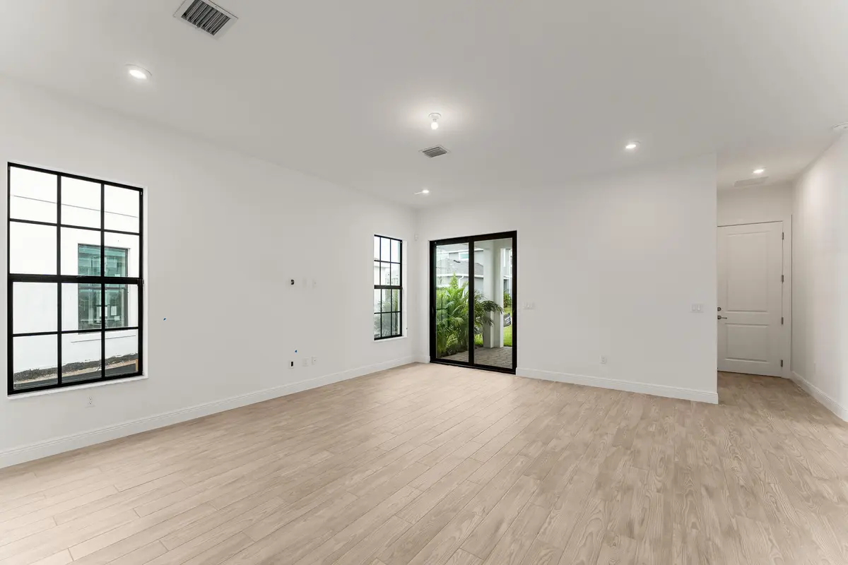 US_SEF_LIVINGSTON_LOT 207_GREAT ROOM at 701 SW Backus Lane, Palm City