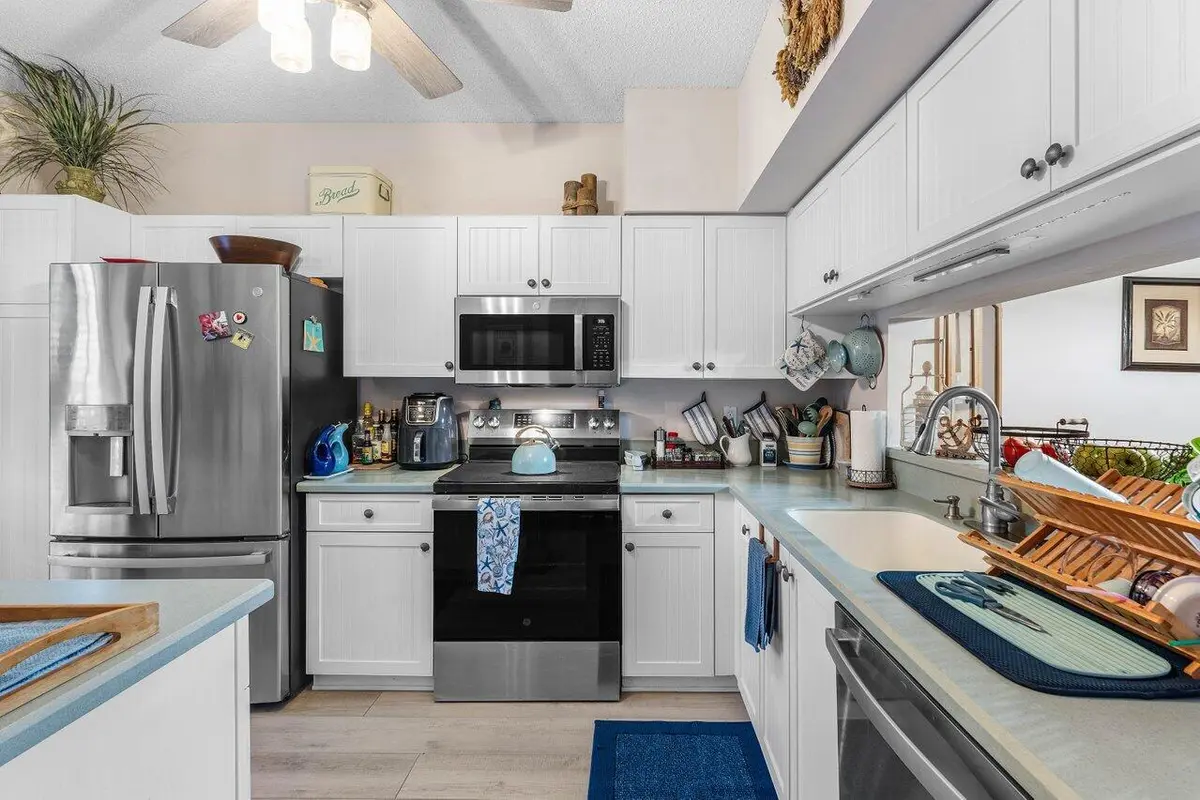 Kitchen newer SS appliances at 1022 Kokomo Key Lane, Delray Beach