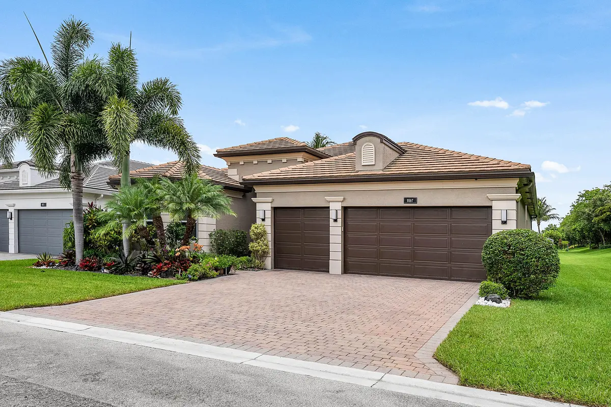 Lushly Landscaped Exterior at 8167 Majestic Mountain Drive, Boynton Beach