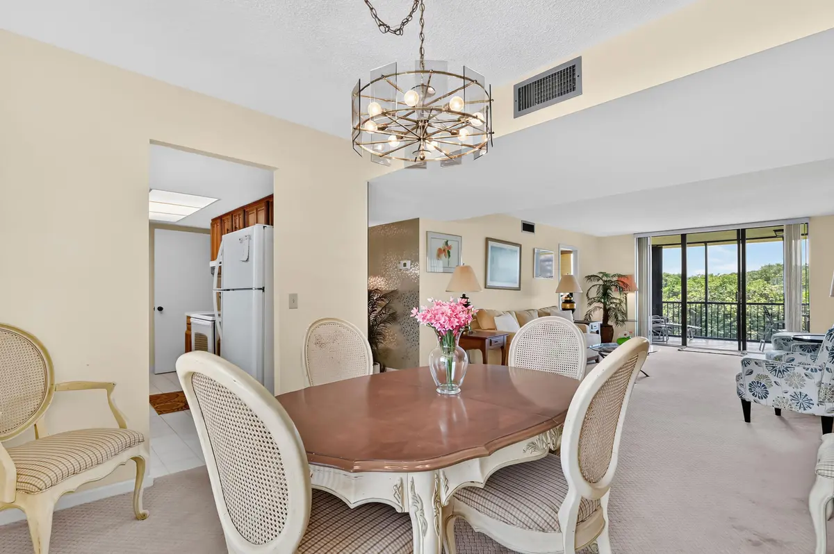 05 Dining area 03 at 5188 Woodland Lakes Drive 332, Palm Beach Gardens