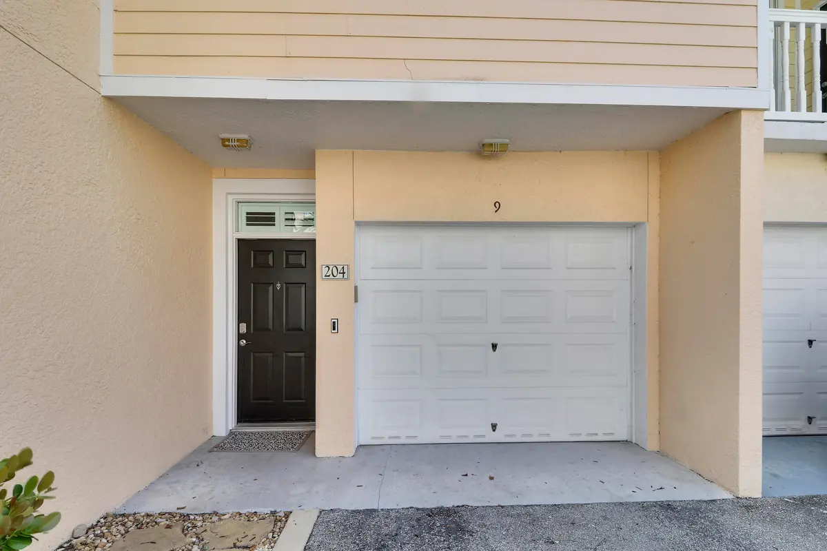 Garage and Front Door at 155 Galicia Way 204, Jupiter