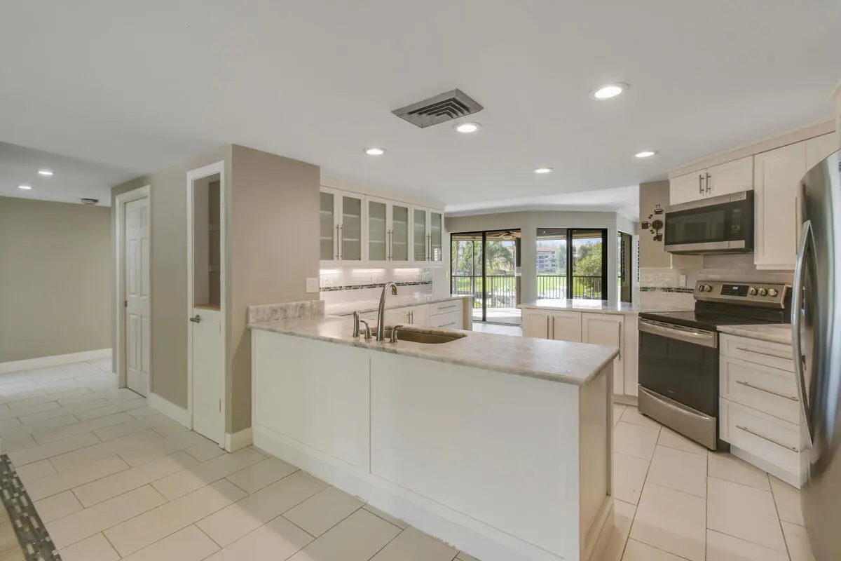 Kitchen to Laundry at 1117 Marine Way K2l, North Palm Beach
