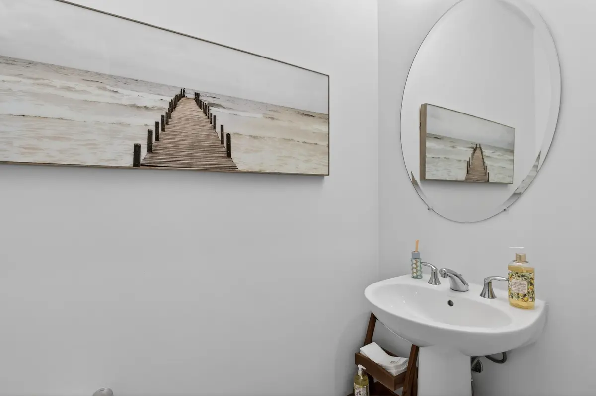 Down Stairs Half Bath 1 at 1823 Sandpiper Pointe Place, Deerfield Beach