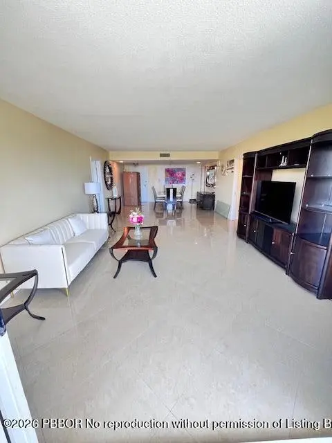 Living room at 2773 S Ocean Boulevard 414, Palm Beach