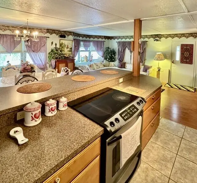 Kitchen overlooking Dining & Living at 31 Grande Vista Way, Port St. Lucie