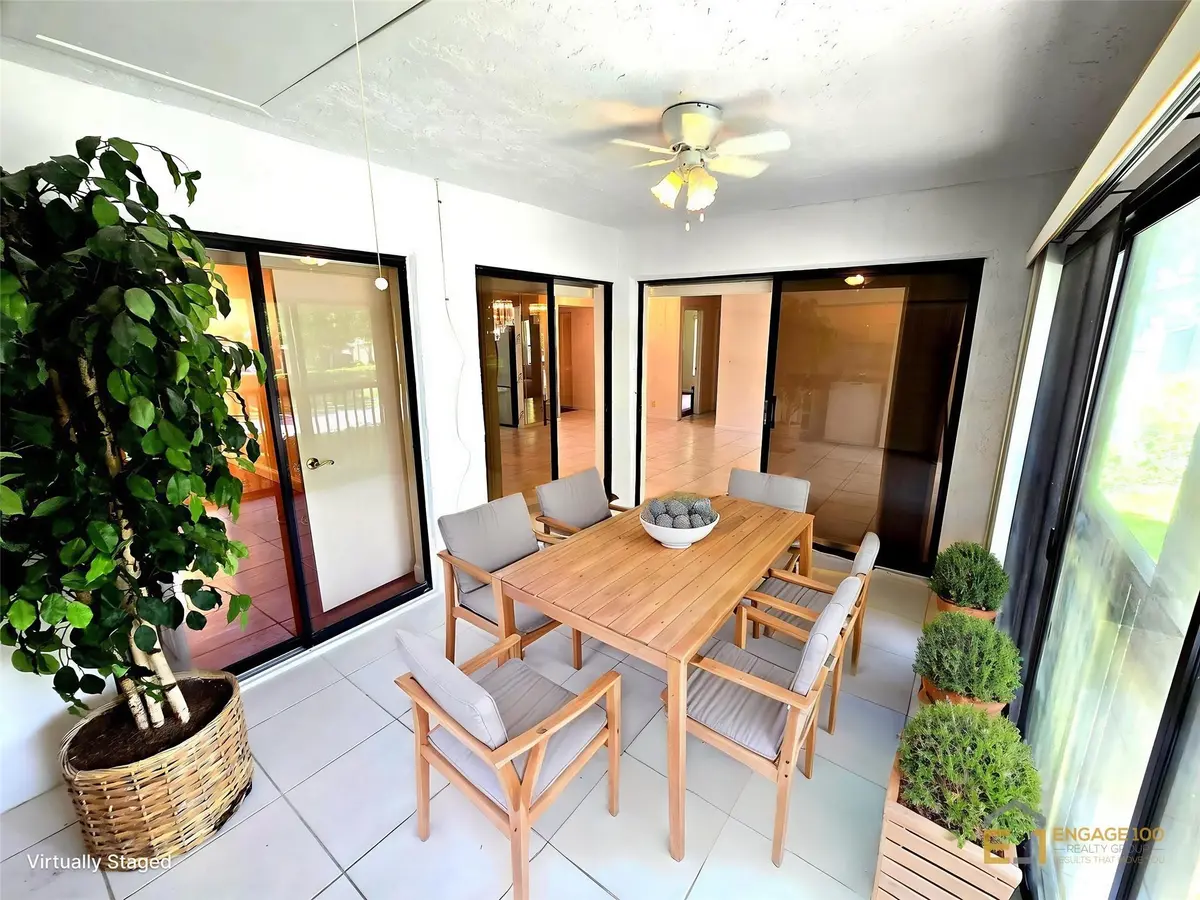 Enclosed/Screened Patio - AI Furnished at 4049 N Carambola Circle, Coconut Creek