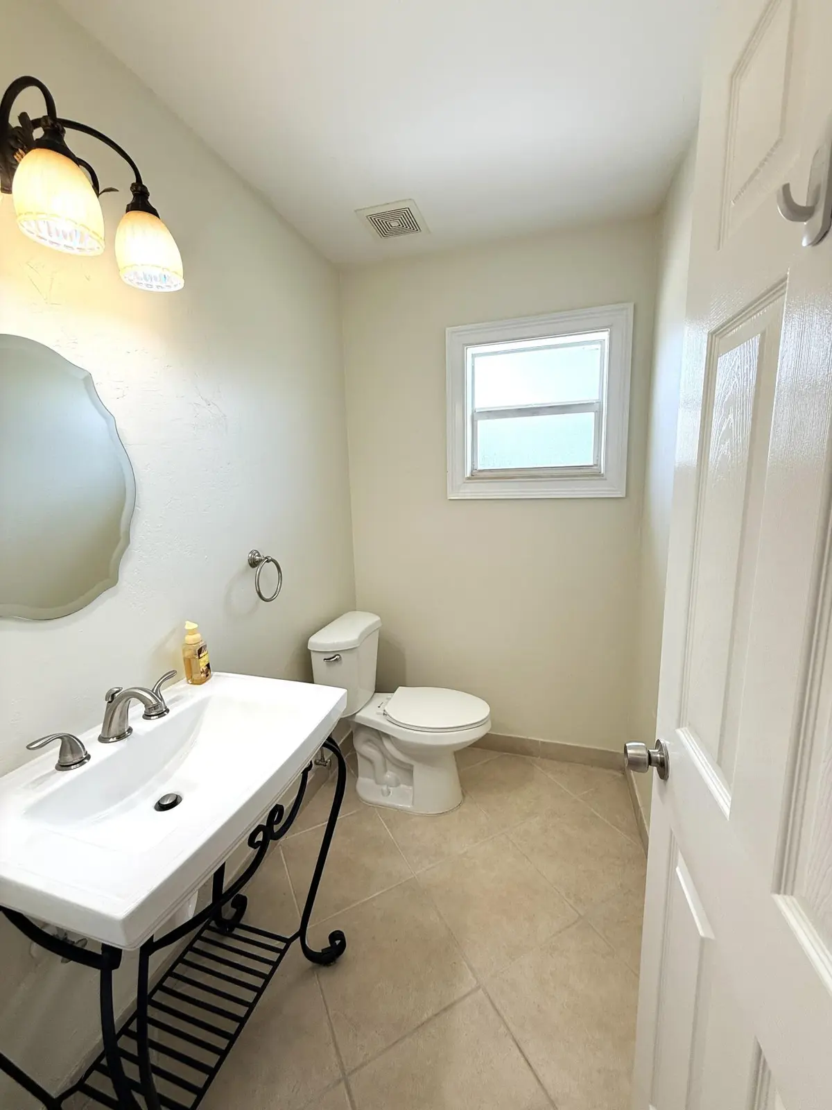 Half Bath at 735 Hummingbird Way 204, North Palm Beach
