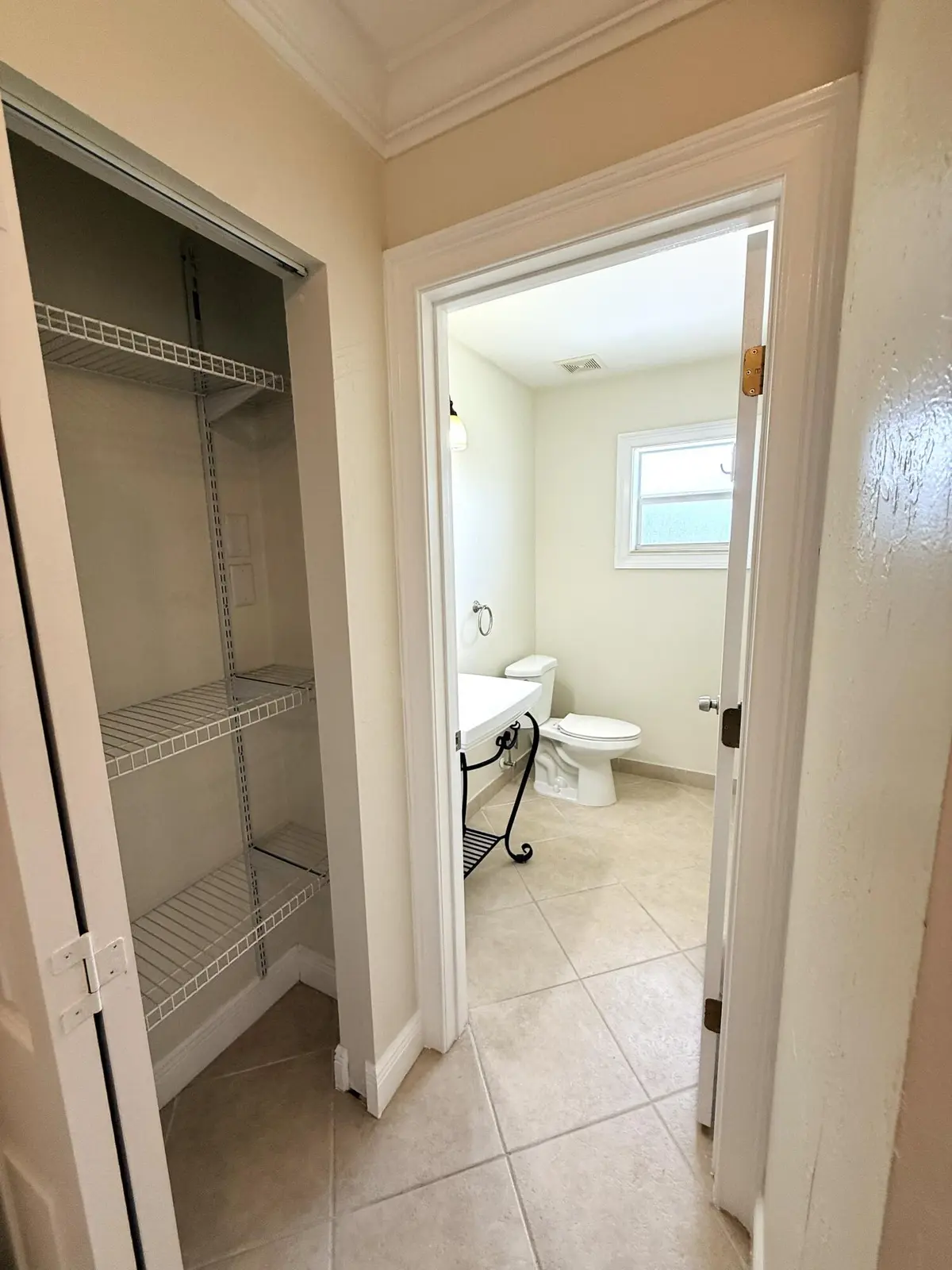 Half Bath_Linen at 735 Hummingbird Way 204, North Palm Beach