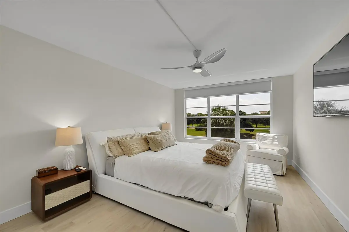 Primary Bedroom with En Suite Bath at 555 Oaks Lane 311, Pompano Beach