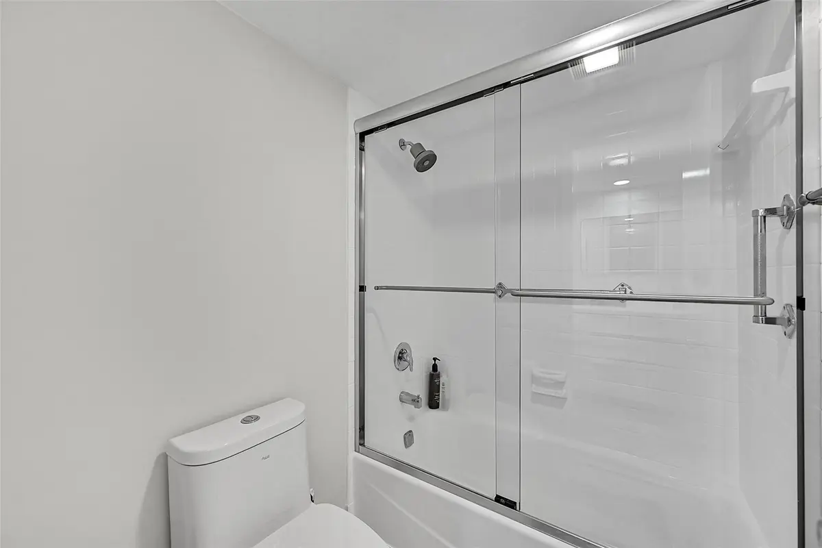 Primary En Suite Bathroom, Shower area at 555 Oaks Lane 311, Pompano Beach