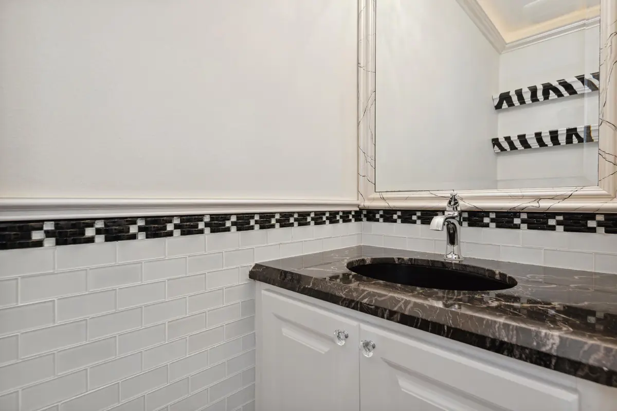 1st Floor Half Bath at 477 Capistrano Drive, Palm Beach Gardens