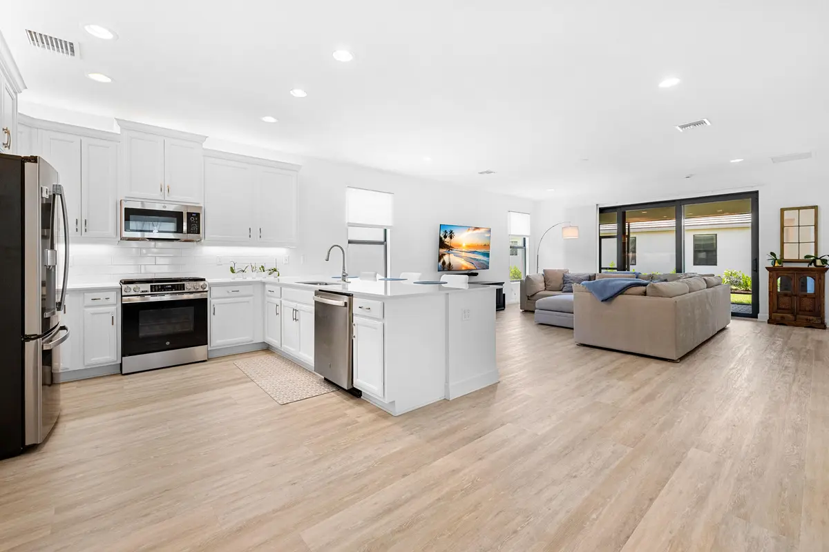 Living room and kitchen at 11584 SW Marine Way, Port St. Lucie