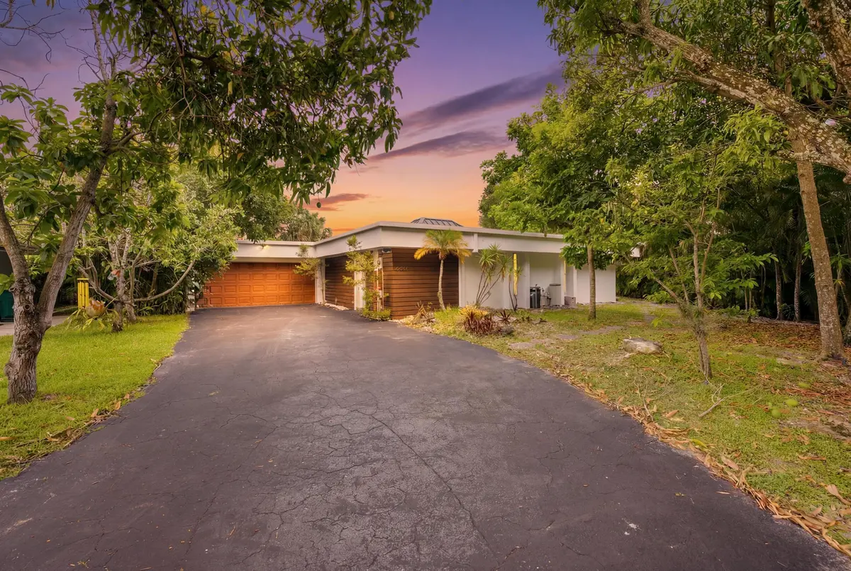 2_001__jjl4930_twilight_3cc84c18 at 4400 Queen Palm Lane, Tamarac