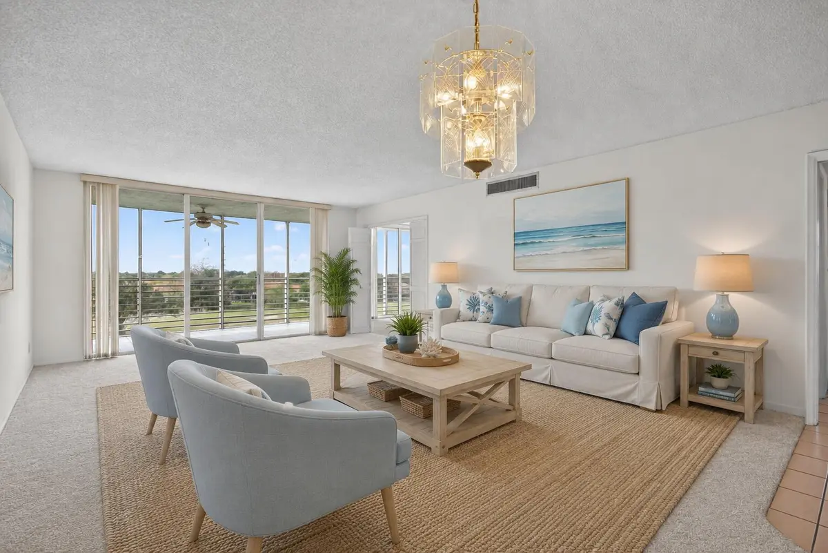 Virtual staged LR at 3507 Oaks Way 501, Pompano Beach