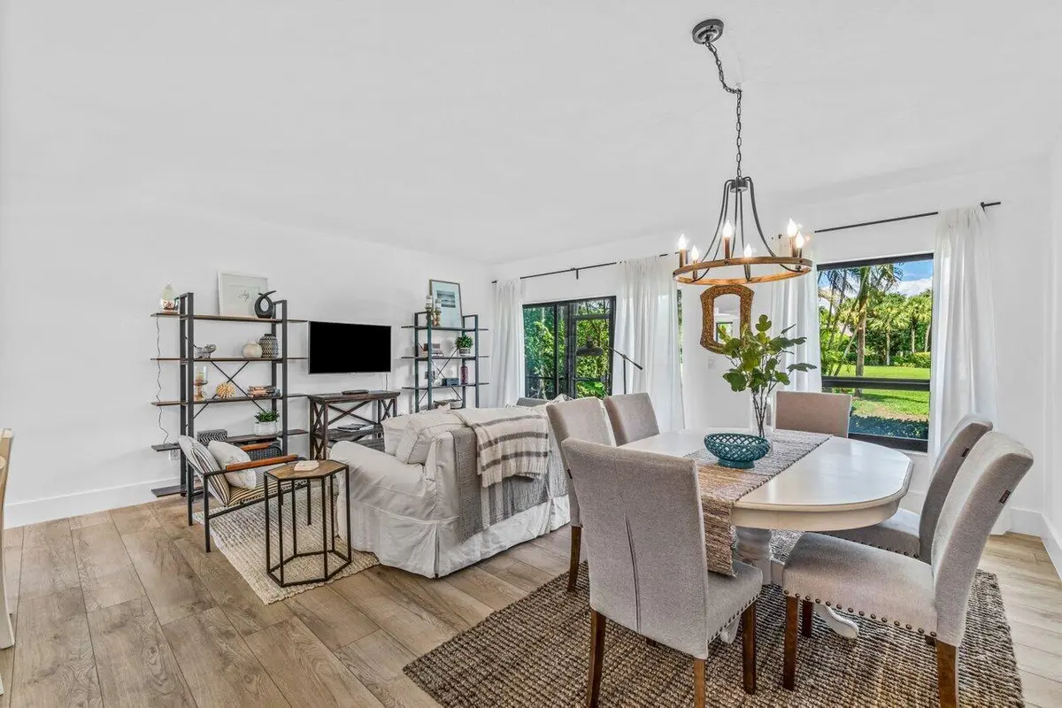 Living and dining area at 13334 Polo Club Road 206, Wellington