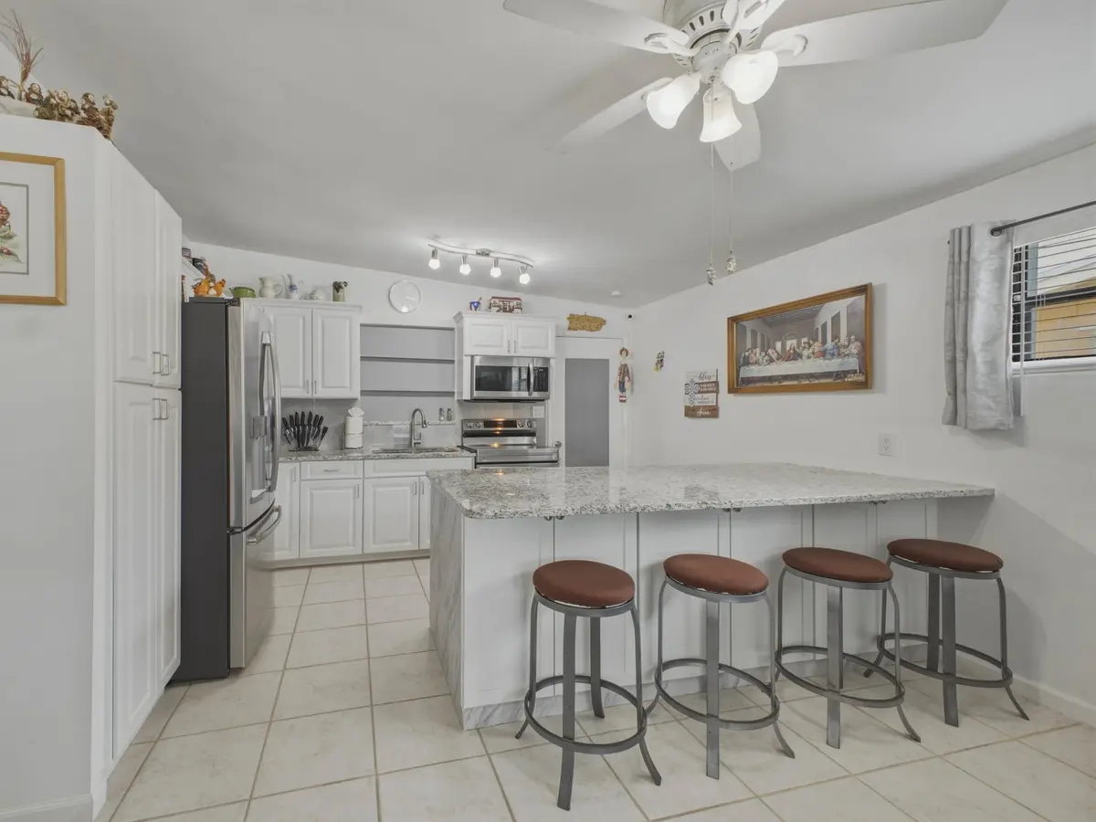 Kitchen Breakfast Bar at 754 Hibiscus Drive, Royal Palm Beach
