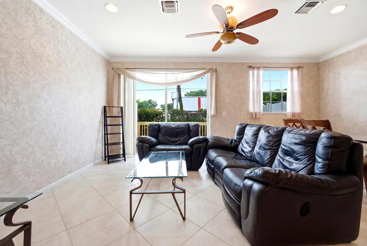 furnished living room at 556 Marbella Circle, North Palm Beach