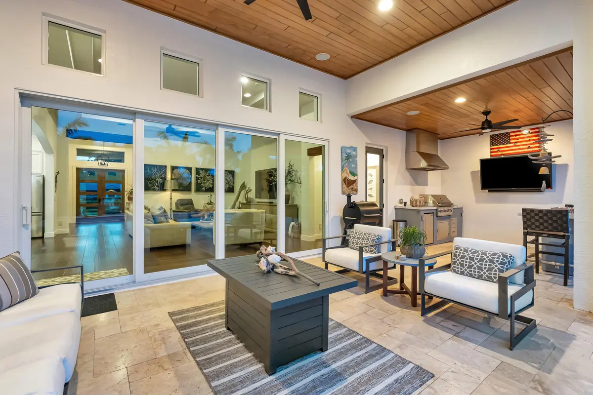 Lanai and outdoor kitchen at 14500 68th Drive, Palm Beach Gardens