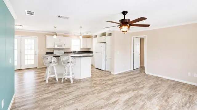 Great room to Kitchen at 7079 SE Bluebird Circle, Hobe Sound