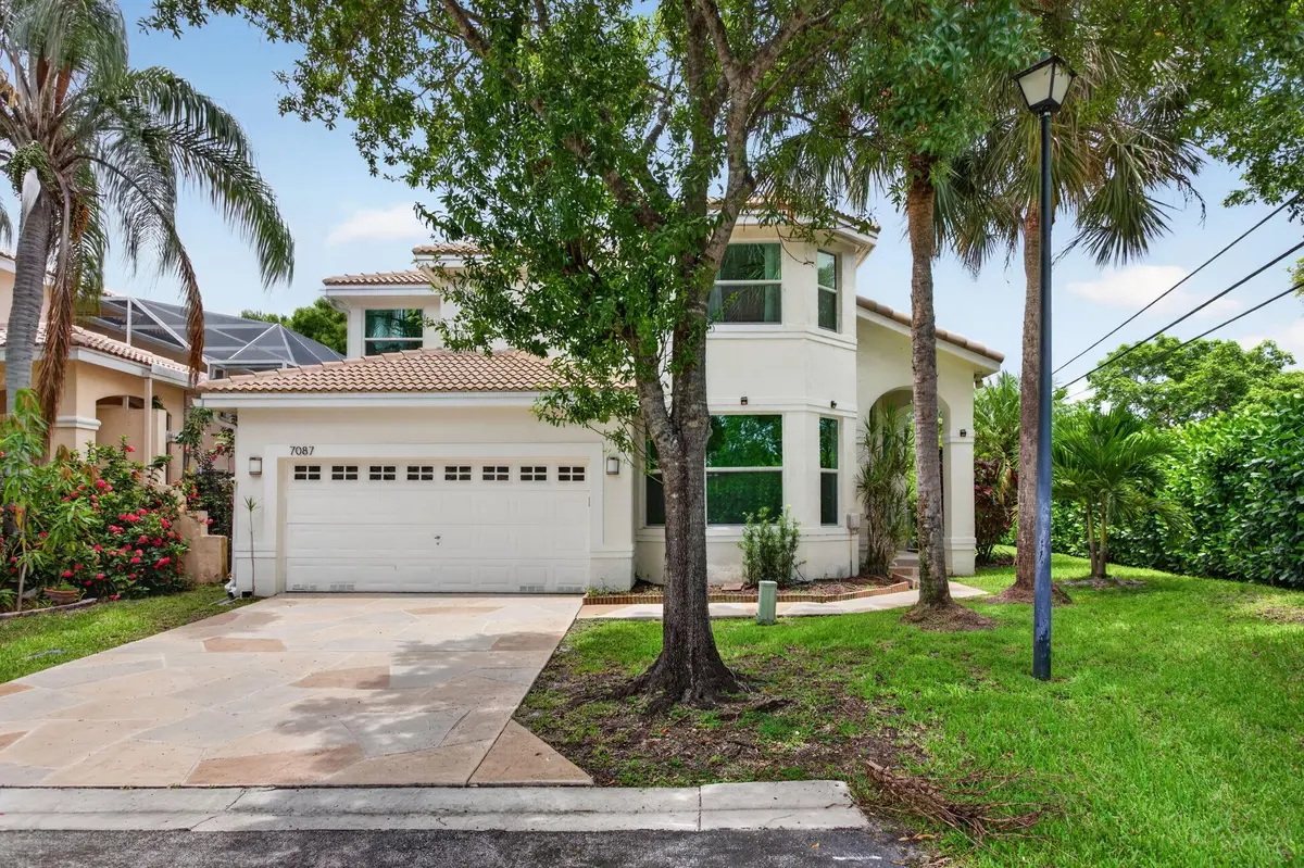 2-web-or-mls-7087-4381 at 7087 NW 78th Place, Parkland