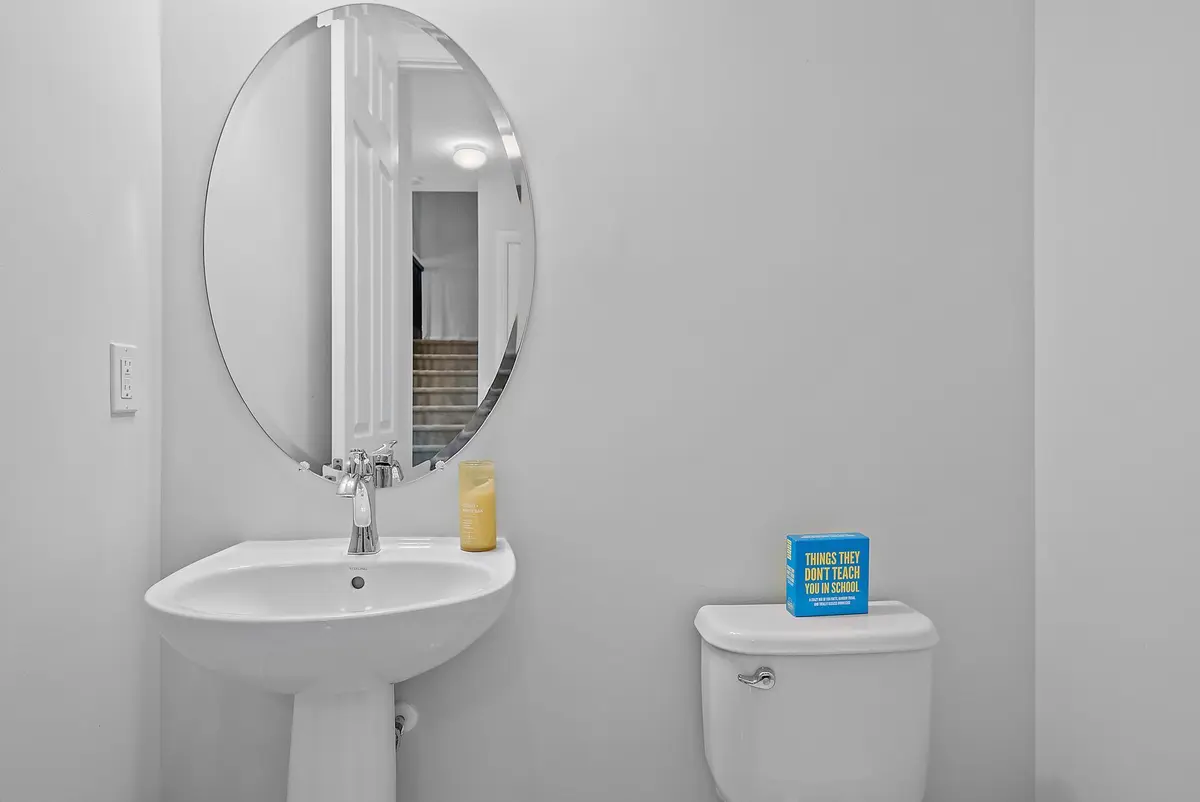 Downstairs Half Bath at 1843 Juno Landing Lane, North Palm Beach