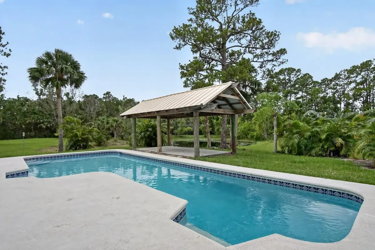 pool at 5041 SW Blue Sky Lane, Palm City