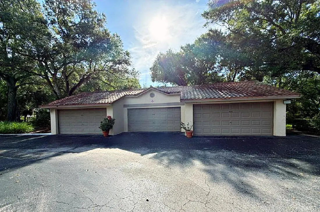 TWO CAR GARAGE... at 9460 Meadowood Drive 104, Fort Pierce