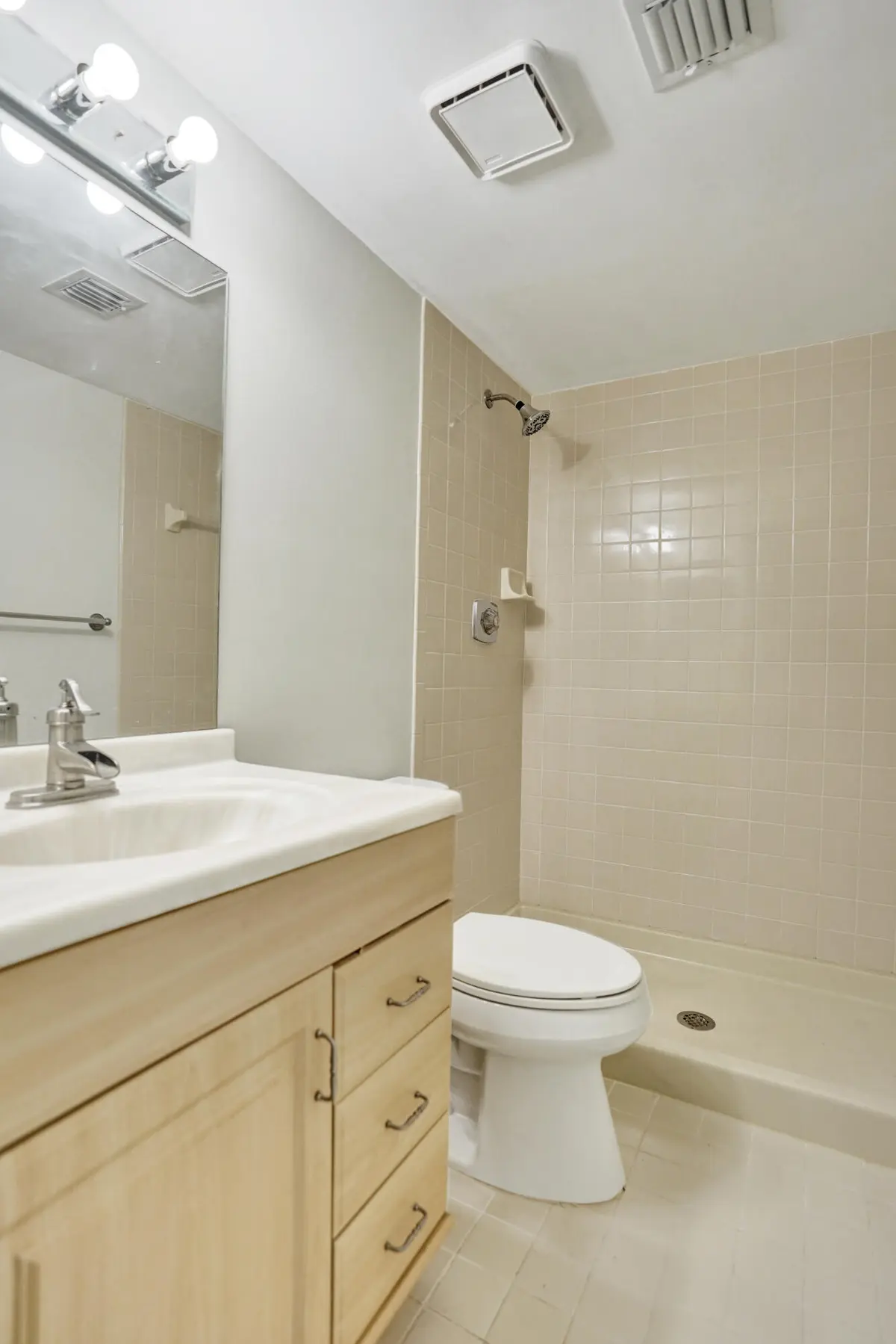Guest Bath and Power Room at 4260 Village Drive D, Delray Beach