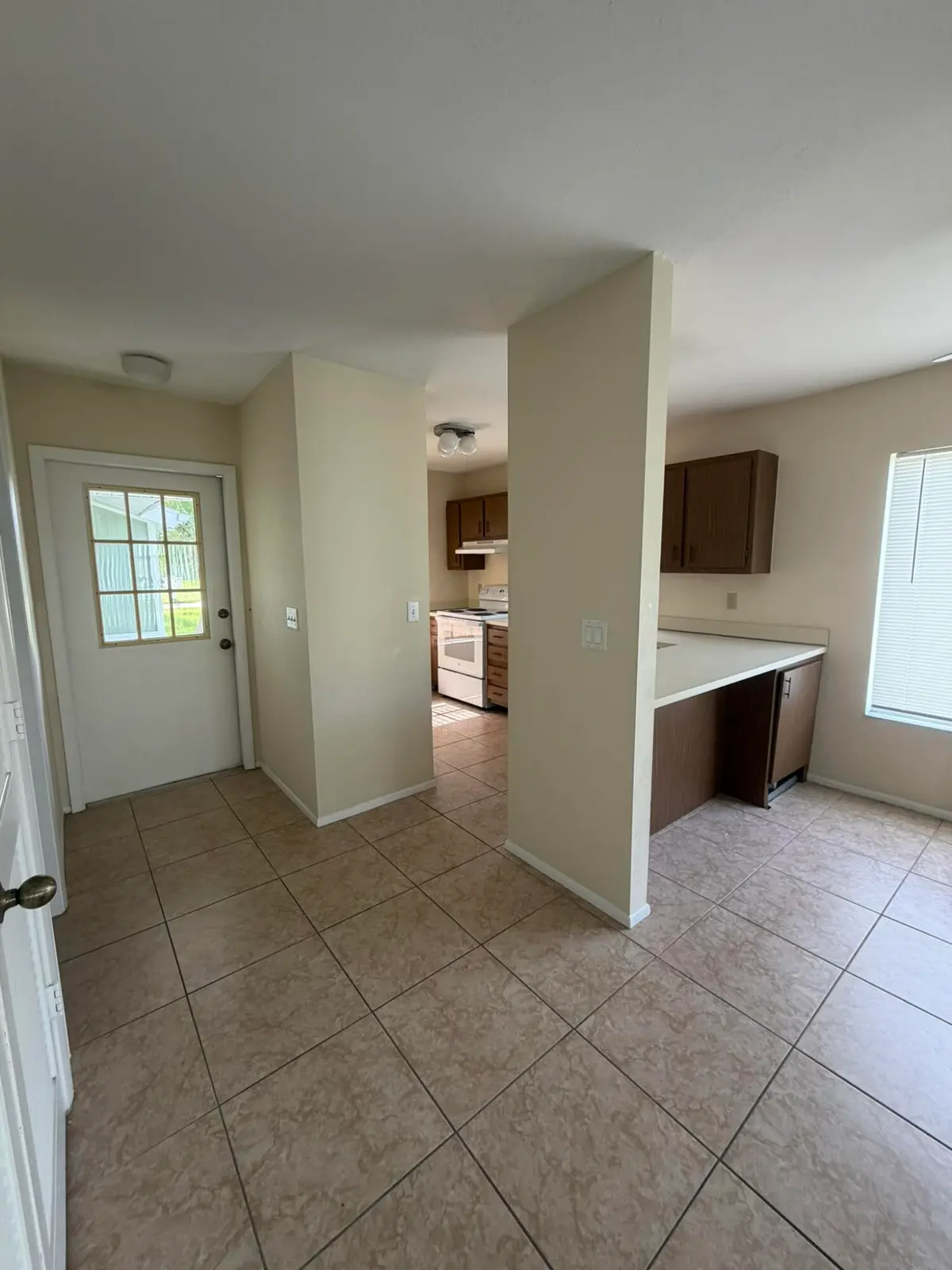 Entry/Kitchen at 1720 SE Linpark Court, Port St. Lucie