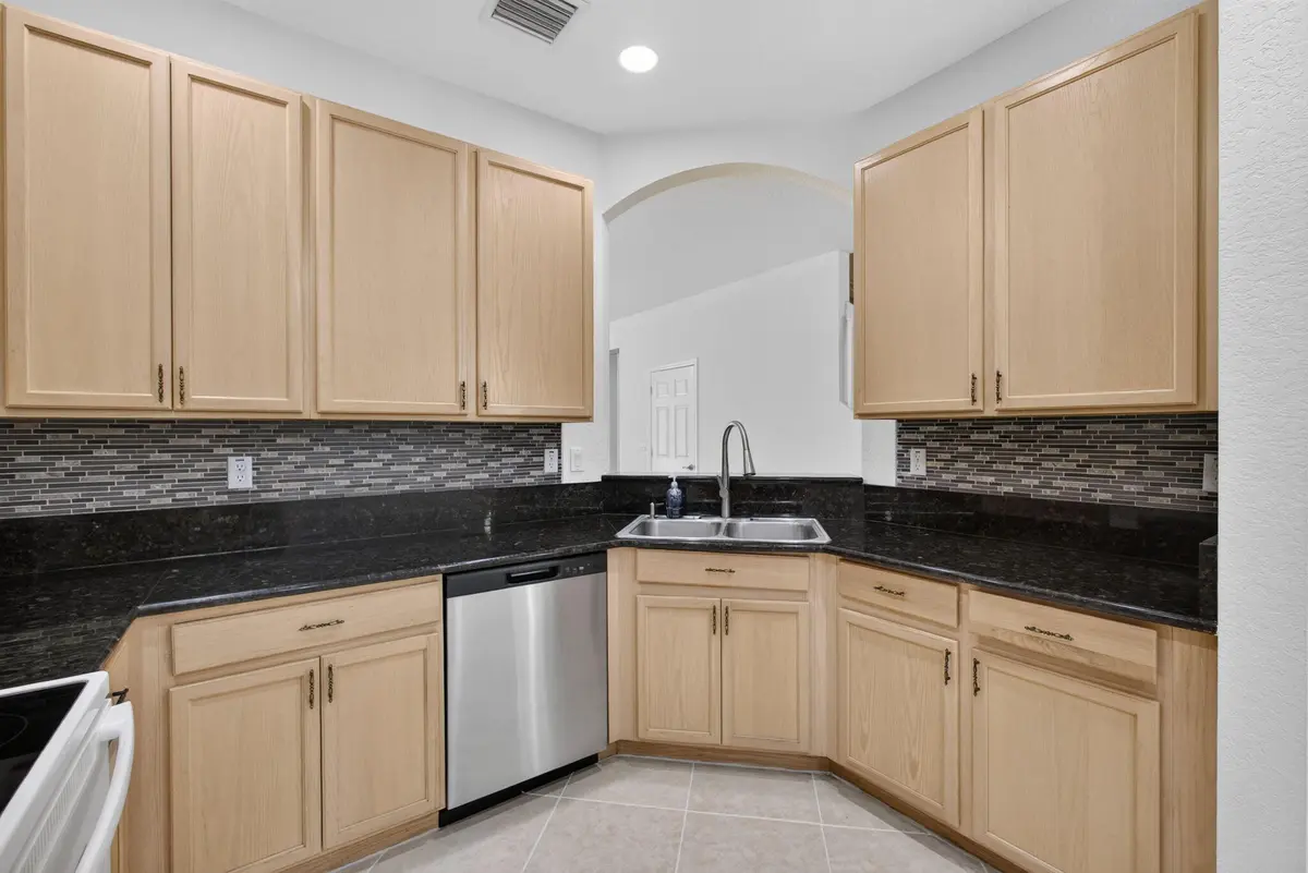 Kitchen at 4991 Bonsai Circle 107, Palm Beach Gardens
