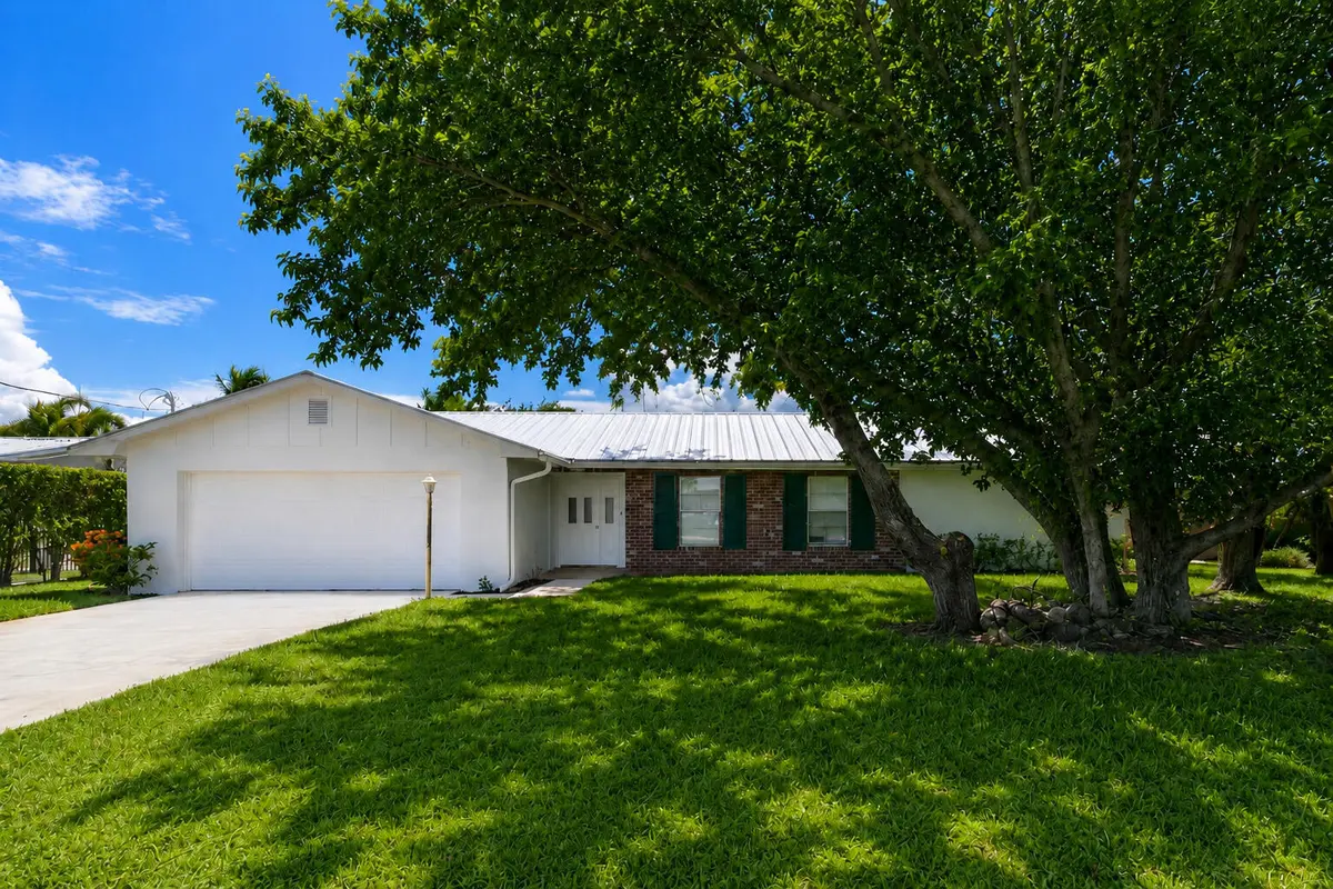 Exterior at 768 SW Hidden River Avenue, Palm City