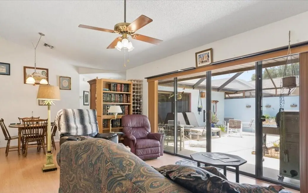 Living Room to Dining Room, Patio at 6287 N Mirror Lake Drive, Sebastian