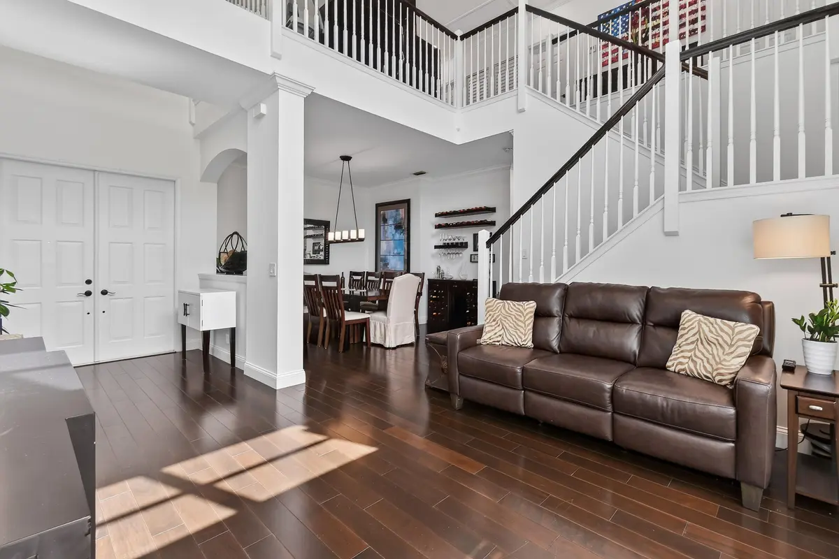 Living Open to Dining at 265 Swallowtail Lane, Jupiter