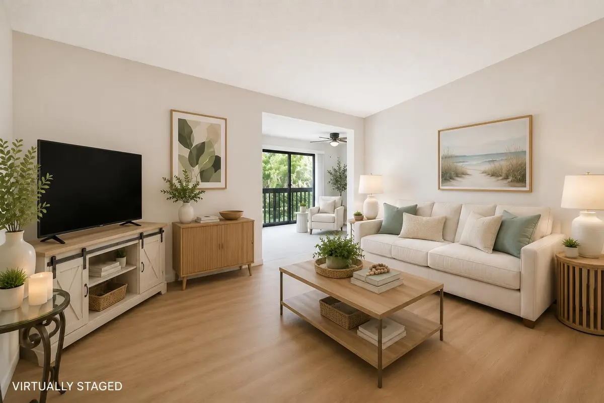 Living Room - Virtually Staged at 1109 Duncan Circle 203, Palm Beach Gardens