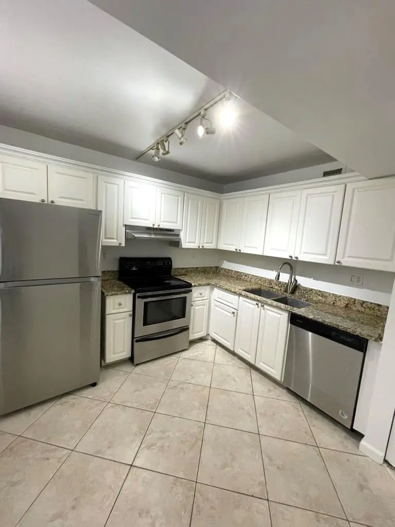 Photo 8 at 711 N PINE ISLAND Road 305, Plantation