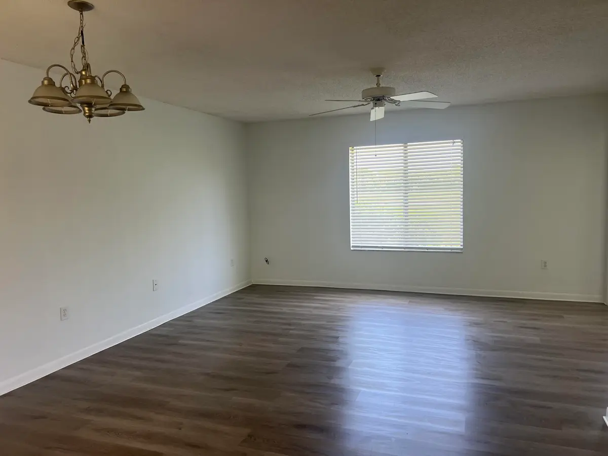 living and dining room at 5373 SE MILES GRANT Road 102, Stuart