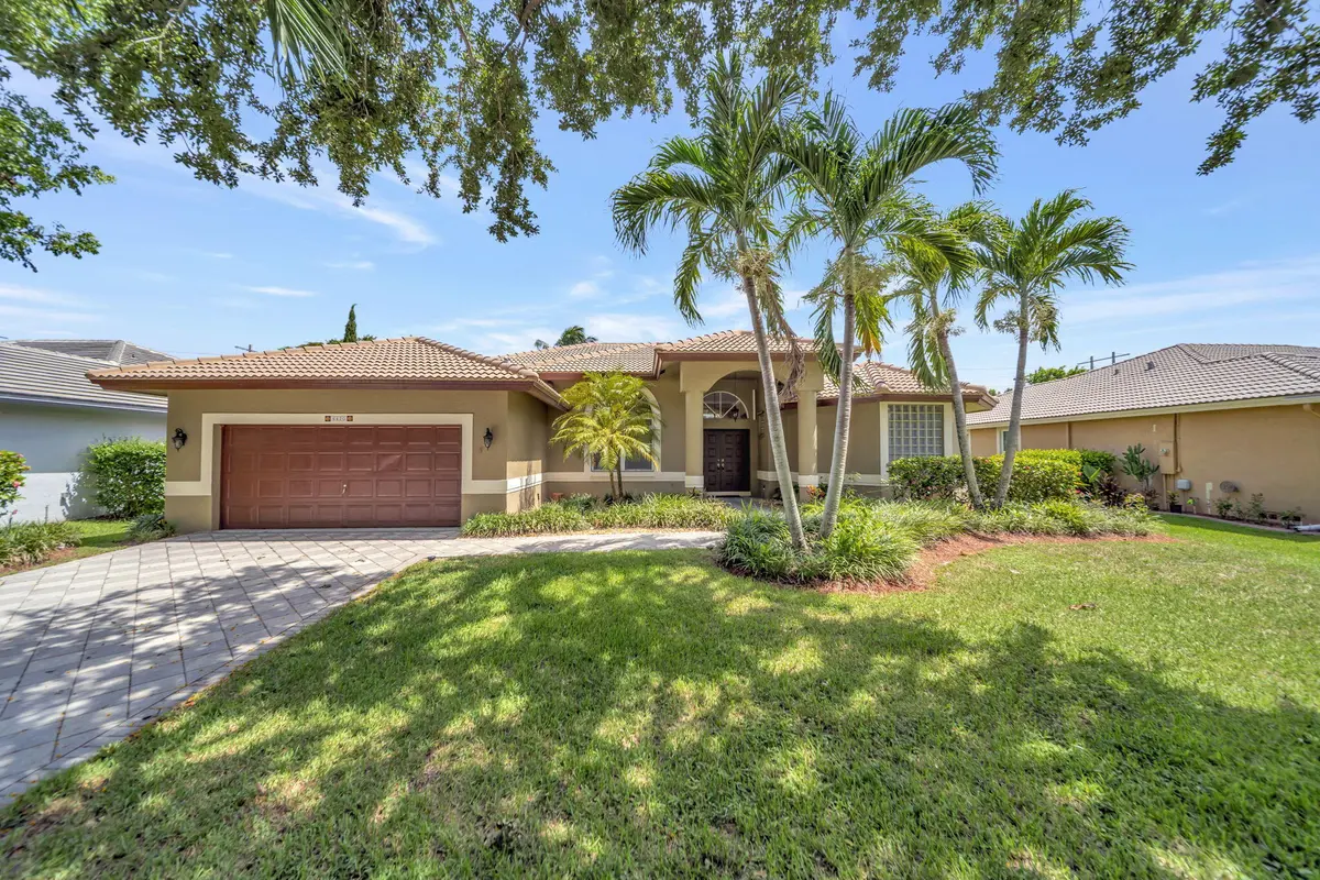1_1_House Front at 6420 NW 41st Street, Coral Springs