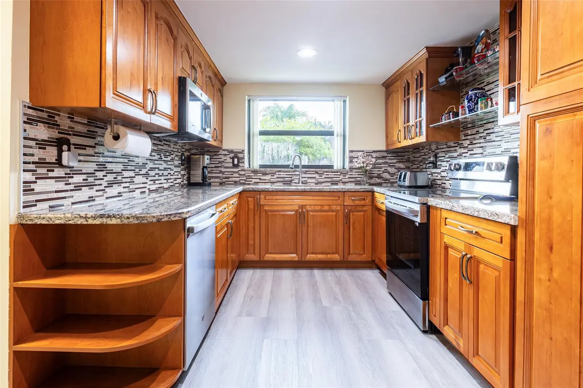 Photo 2 at 8973 Palm Tree Lane, Pembroke Pines