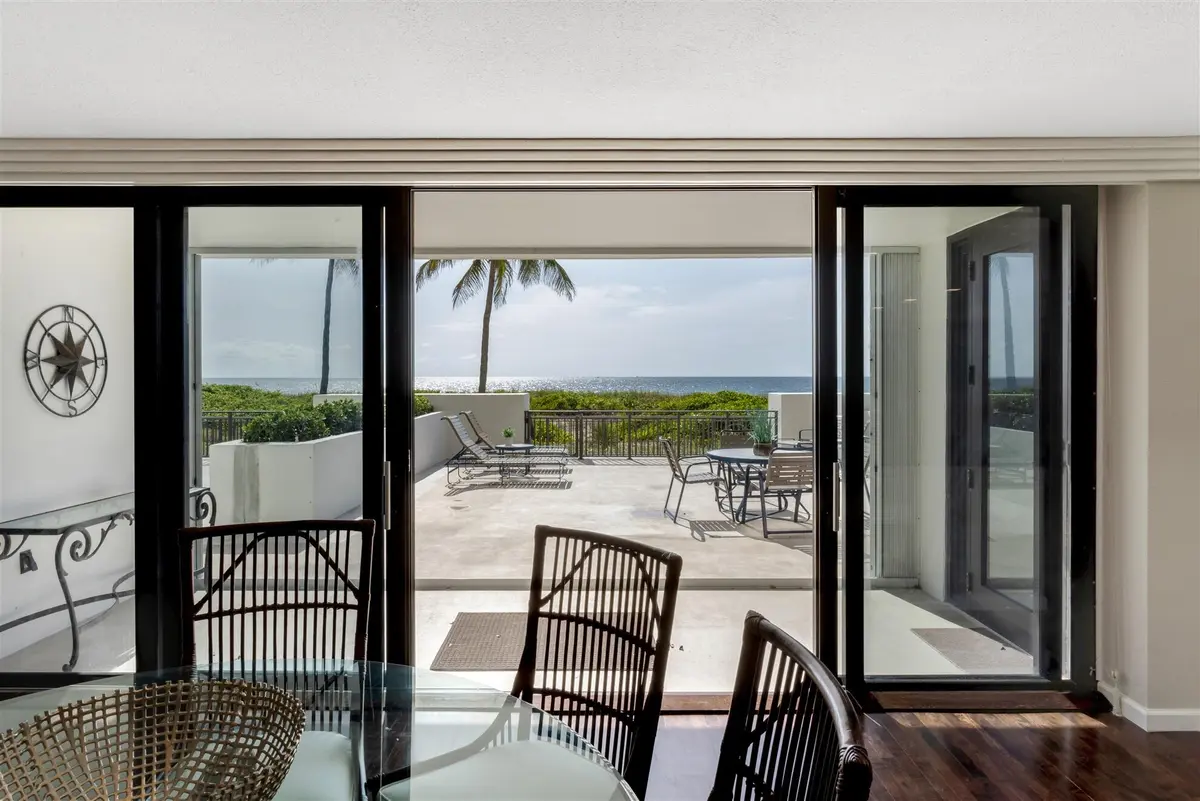 DINING TO PRIVATE PATIO AND OCEAN VIEW at 1800 S Ocean Boulevard Villa E, Boca Raton
