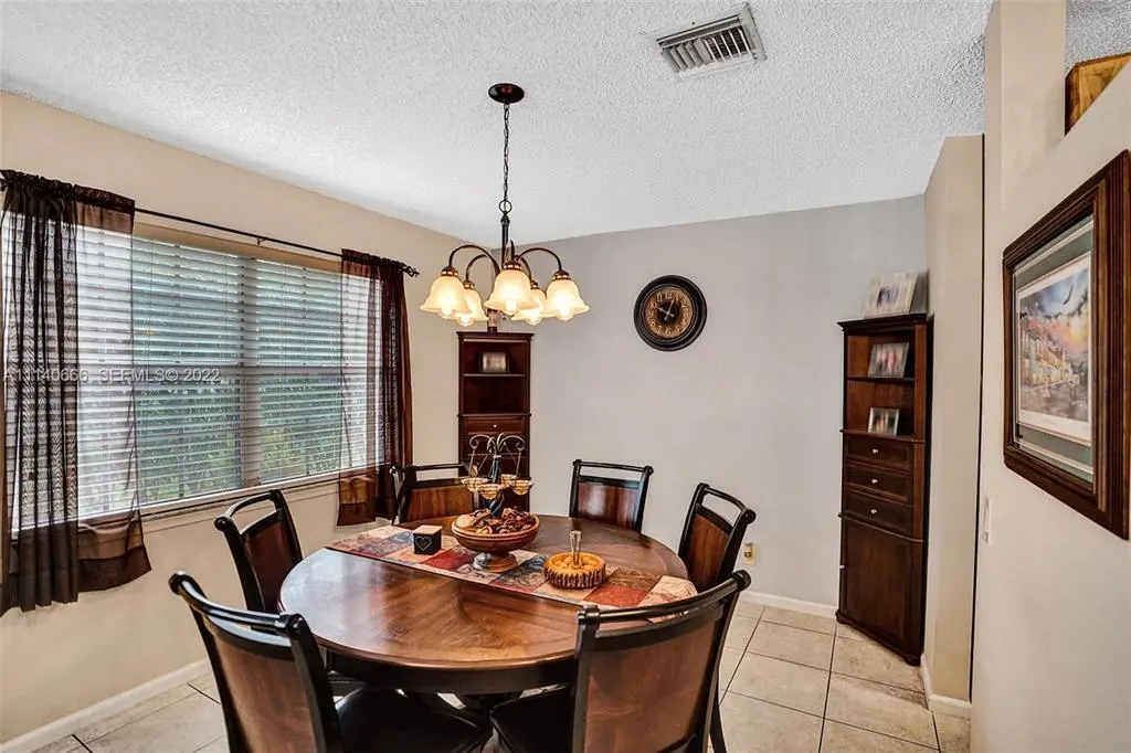 DINING at 4941 Riverside Drive, Coral Springs
