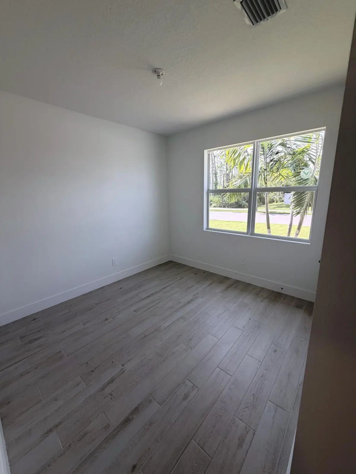 Lot 16 bedroom 2 at 6650 SE Park Trace Drive, Stuart