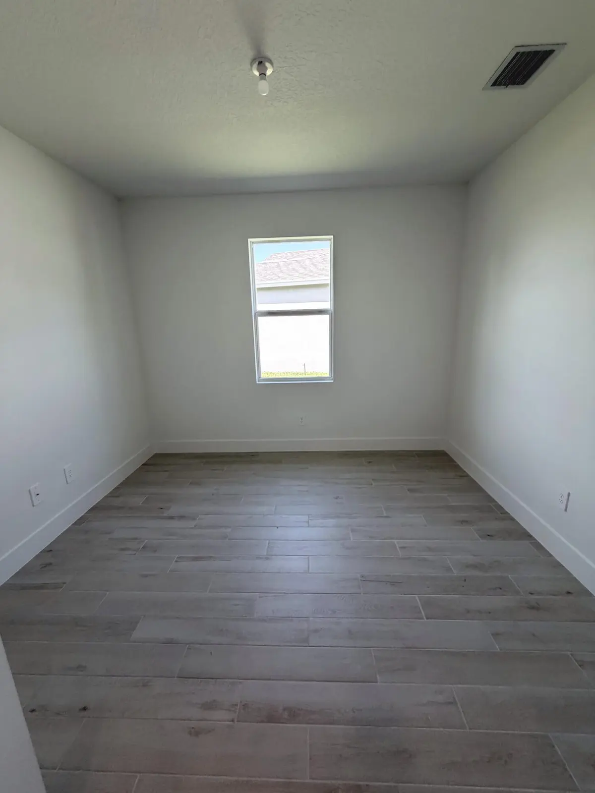 Lot 16 bedroom 4 at 6650 SE Park Trace Drive, Stuart