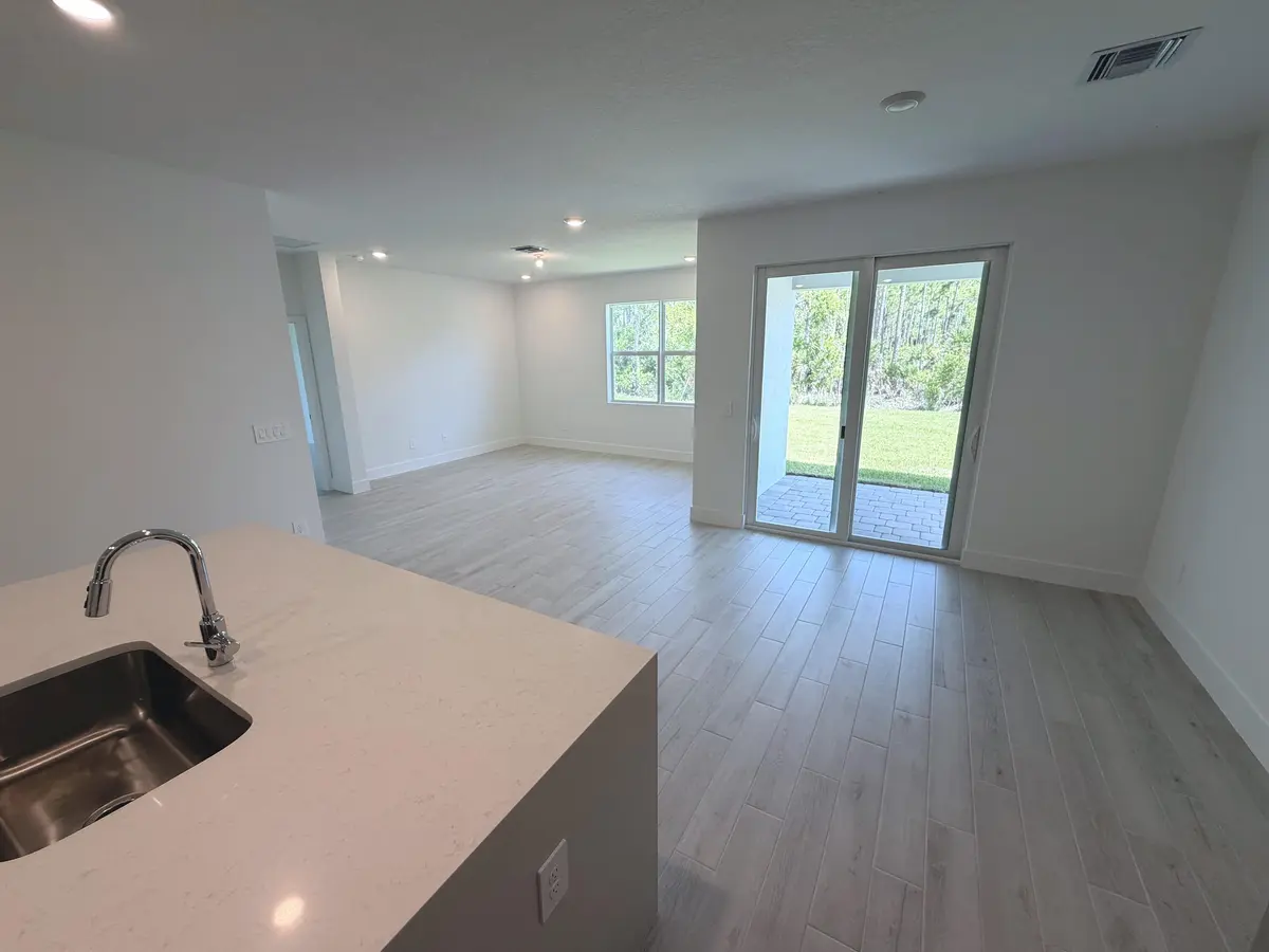 Lot 16 great room at 6650 SE Park Trace Drive, Stuart