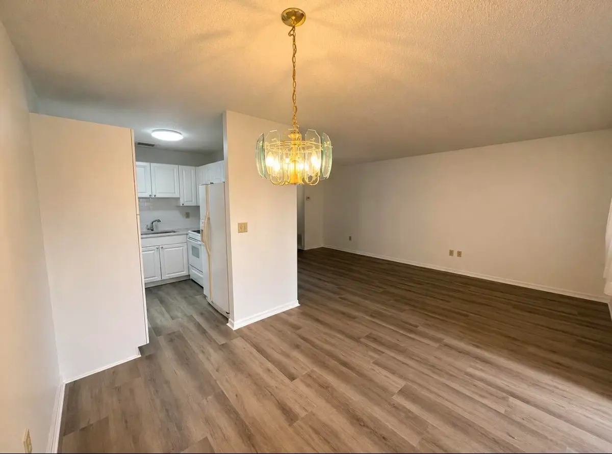 DINING ROOM INTO LIVING AREA at 12 Vista Palm Lane, Vero Beach